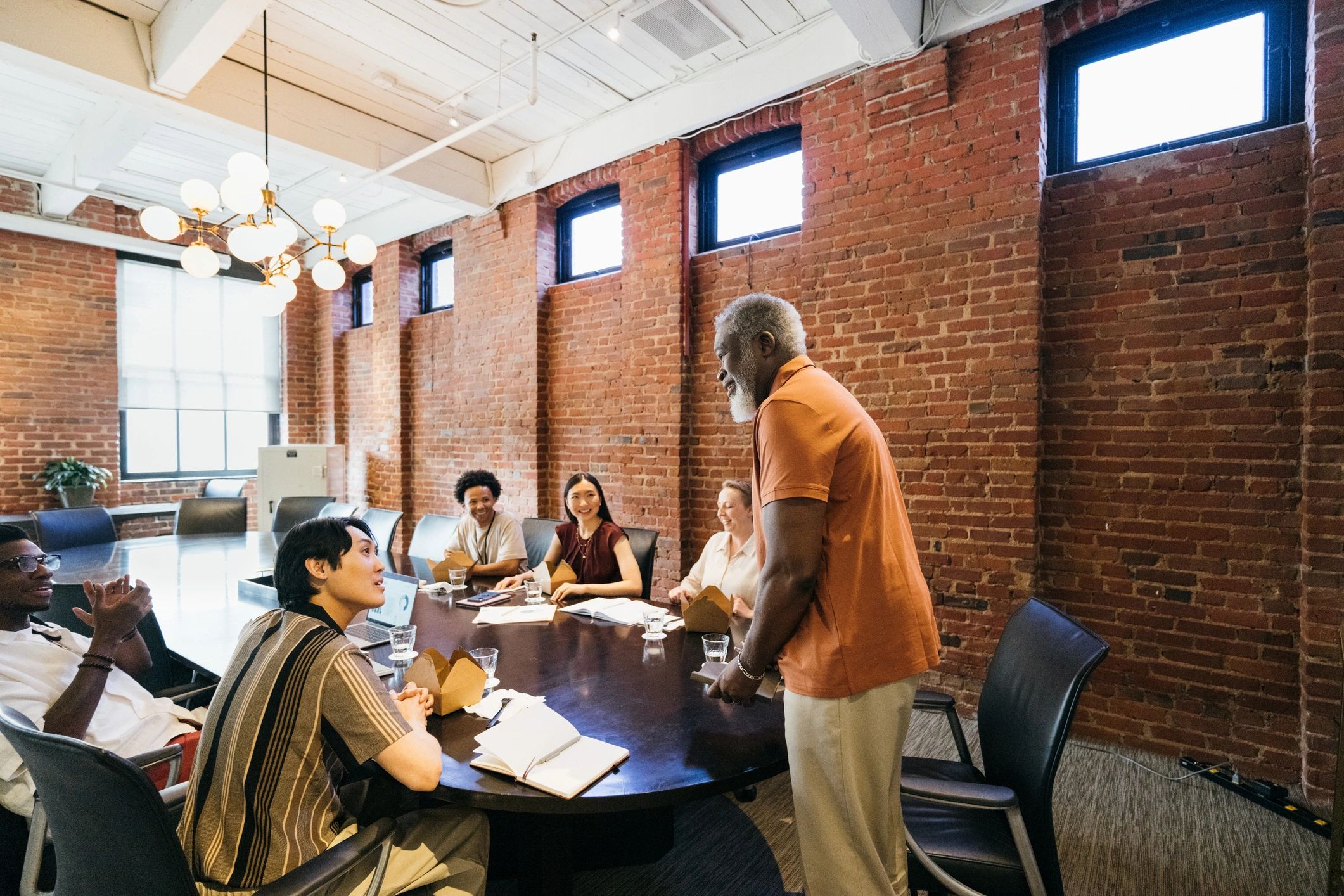 Editorial team meeting around a table